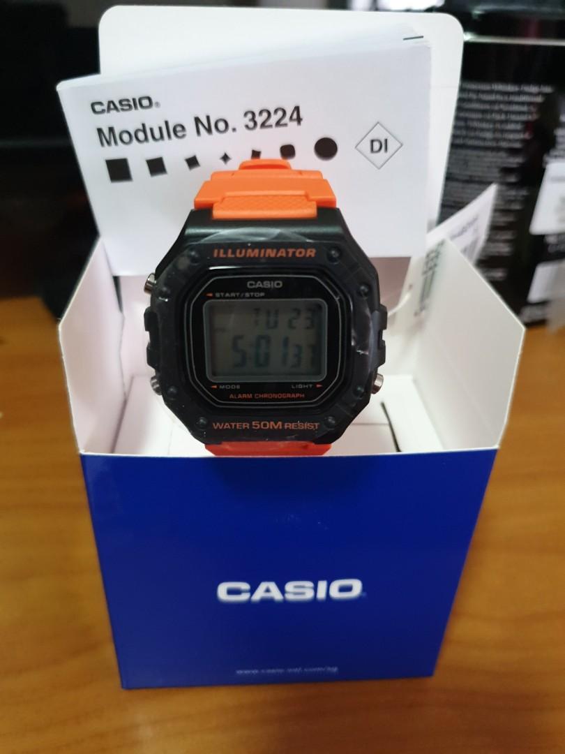 casio black and orange watch