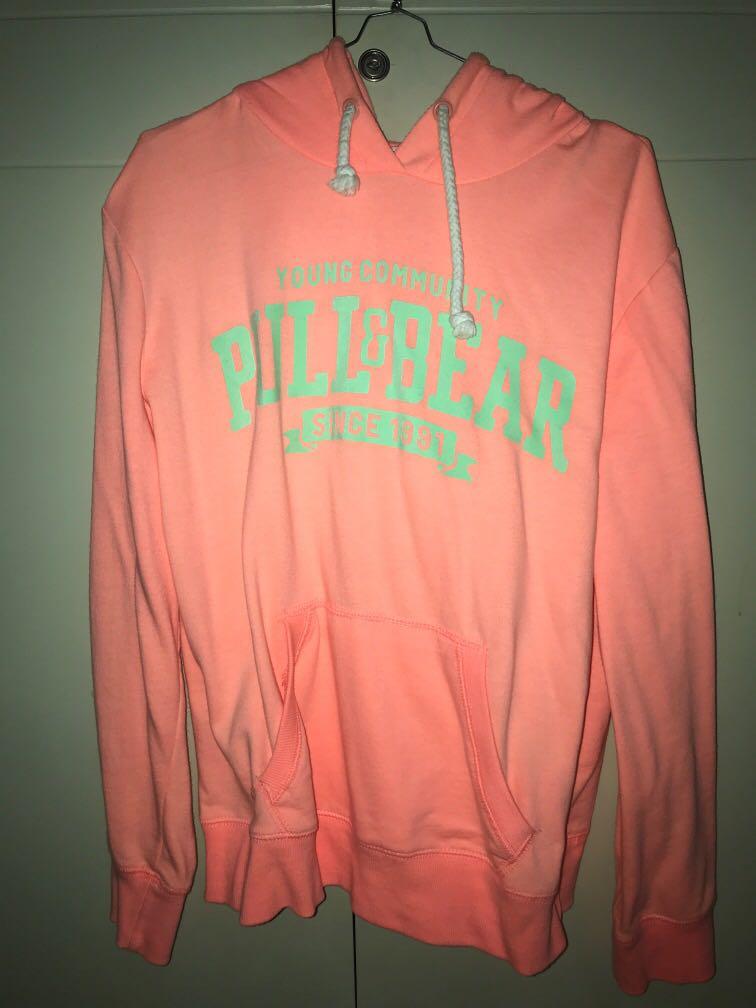 Hoodie neon pink pull bear Fesyen Wanita Pakaian Wanita Lainnya di Carousell