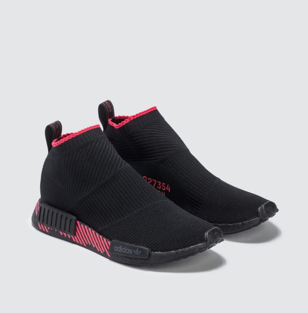 nmd cs1 black and red