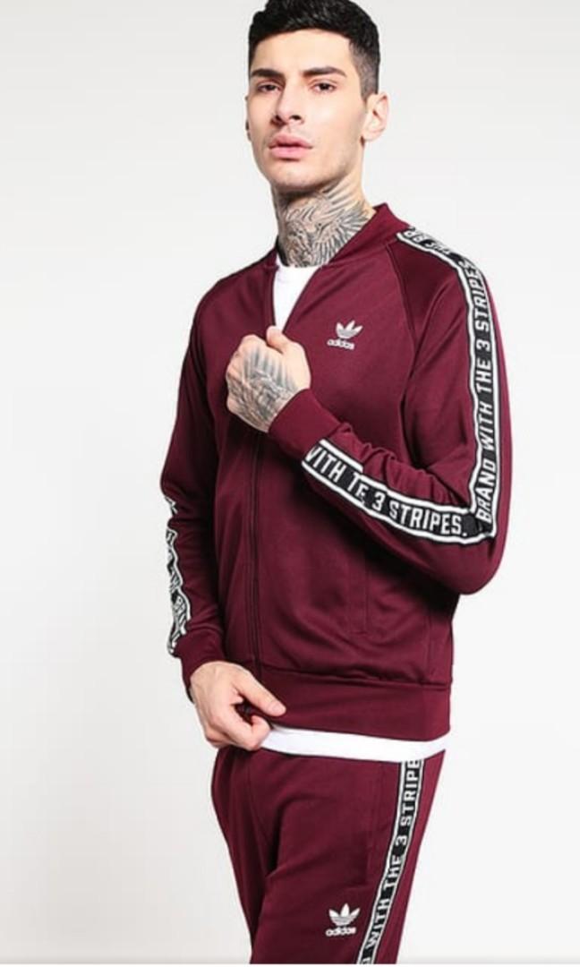 adidas the brand with the 3 stripes tracksuit