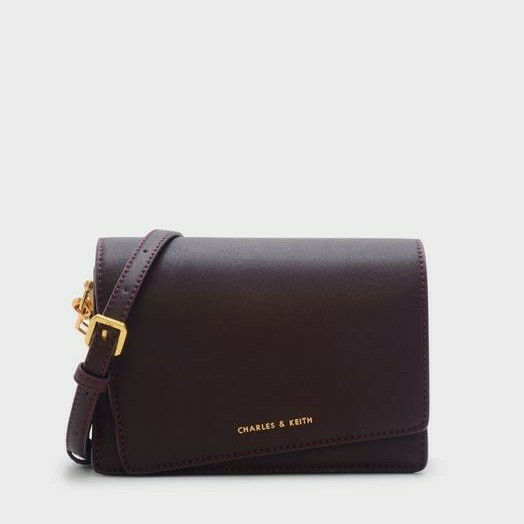 Asymmetric front flap 2025 bag