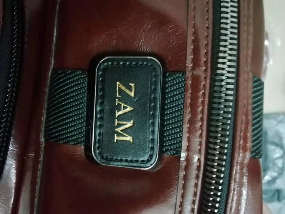 Tumi stamping servis engraving monogram, Luxury, Bags & Wallets on Carousell