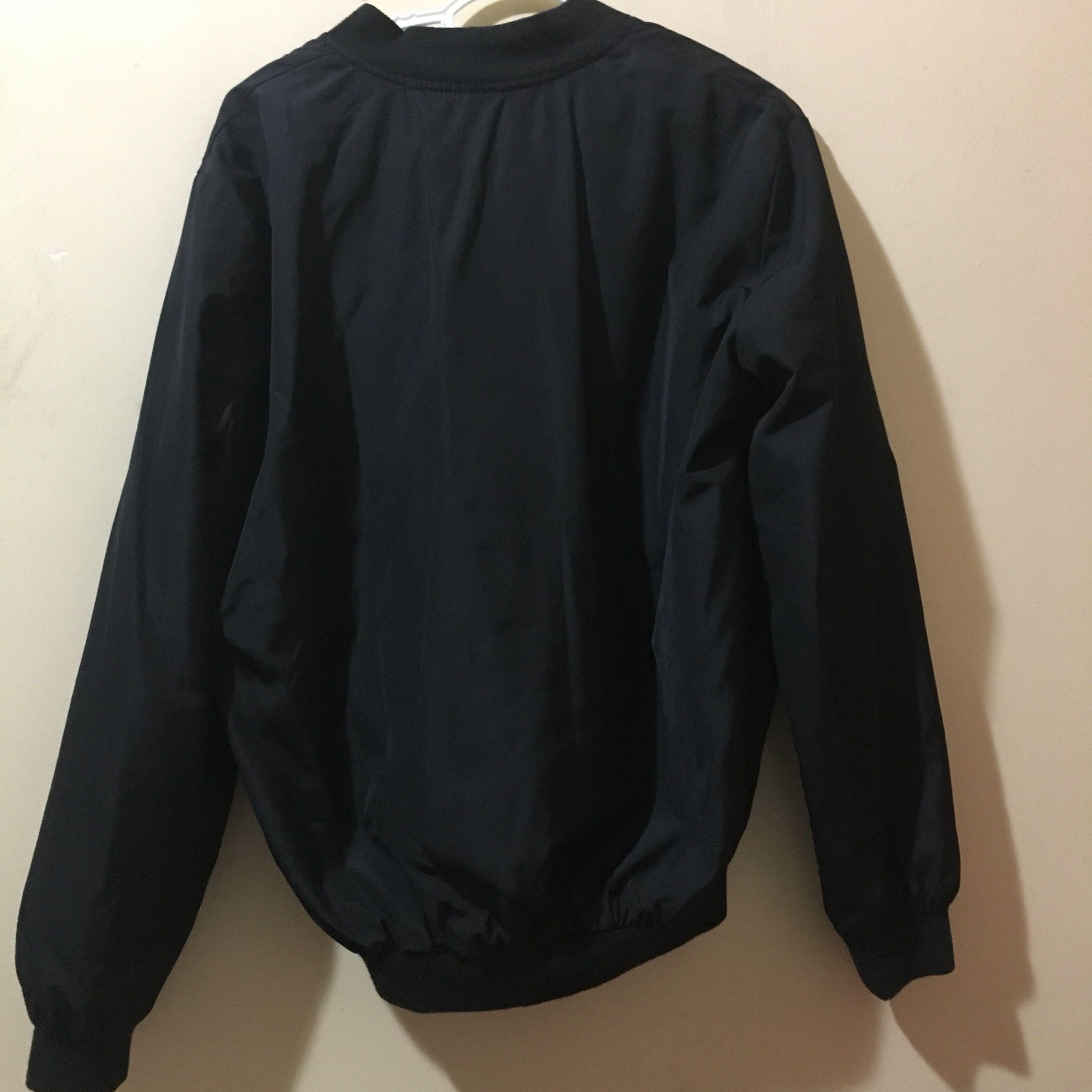 Black Bomber Jacket (Category: Coats, Jackets and Outerwear) located in Bangi. Submitted by shopwithif (Listing ID 241796521, Image 2). Description: Black Bomber Jacket • free size (fits S to L) • condition 8/10 • zip works perfectly fine.