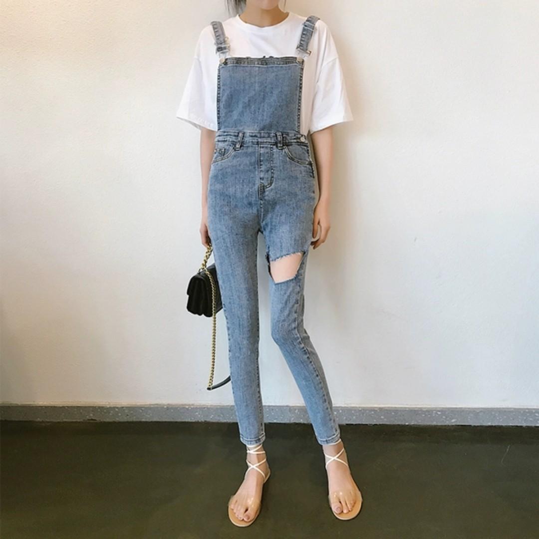denim ripped jumpsuit