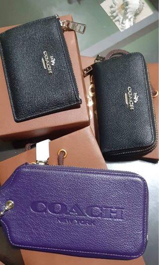 Authentic Coach small leather goods.