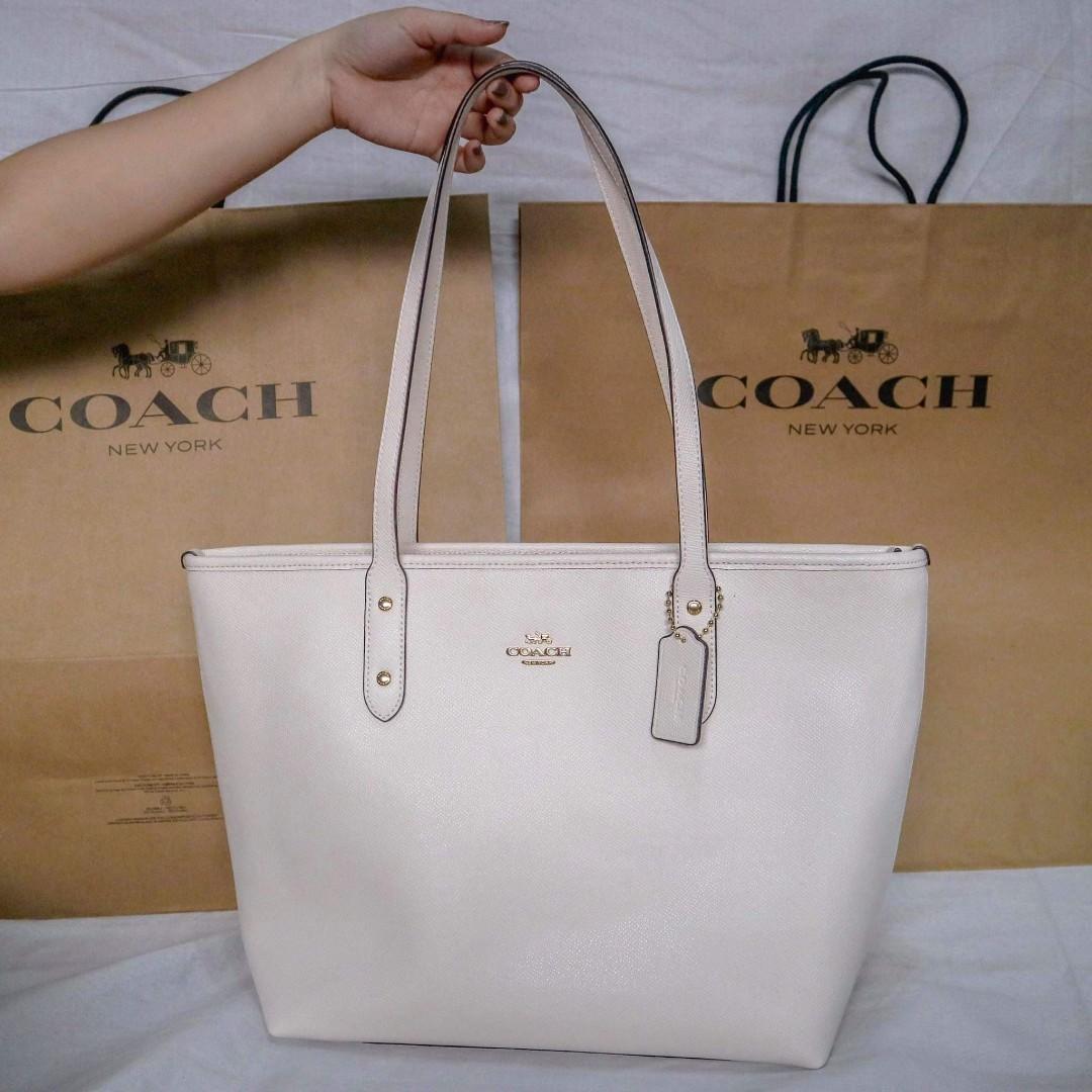 Coach white crossgrain city zip tote bag, Luxury, Bags & Wallets on  Carousell