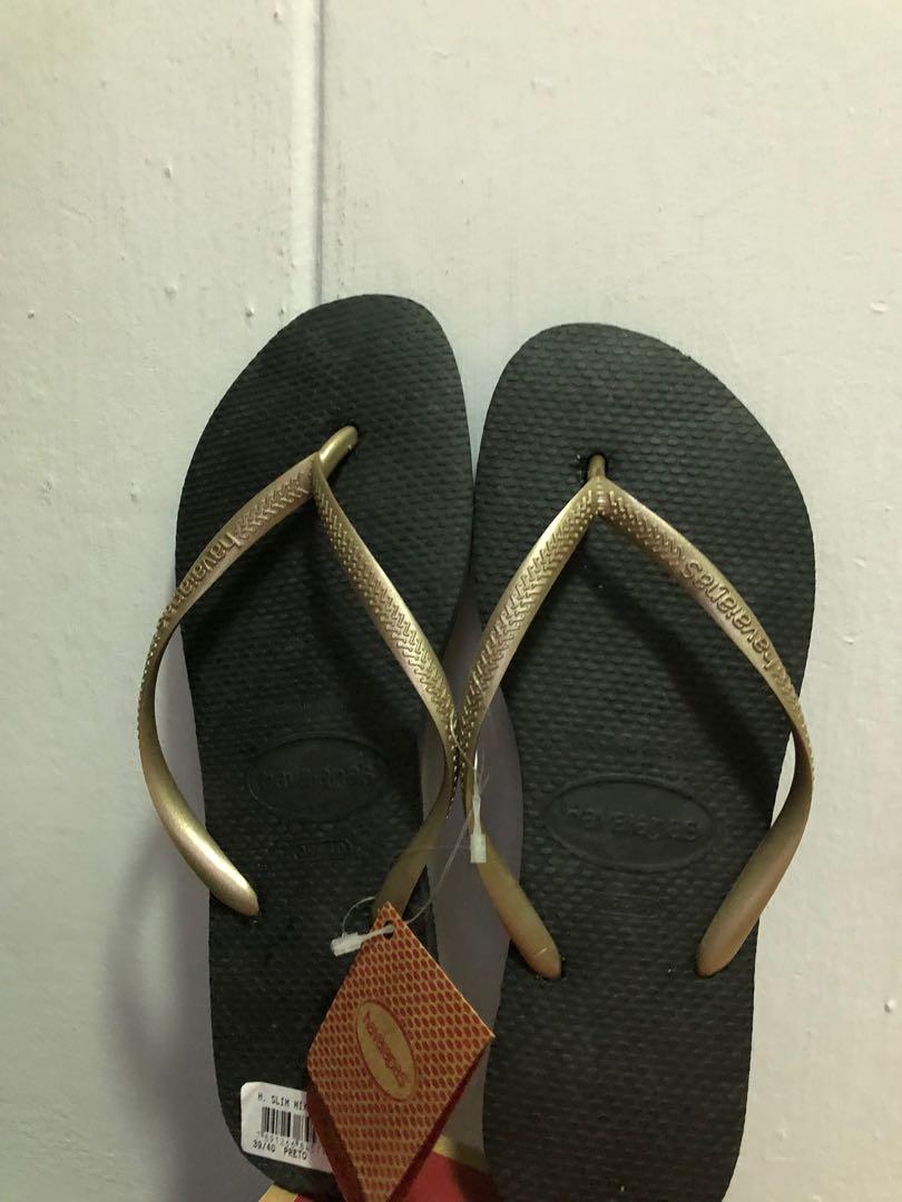 black and gold havaianas flip flops