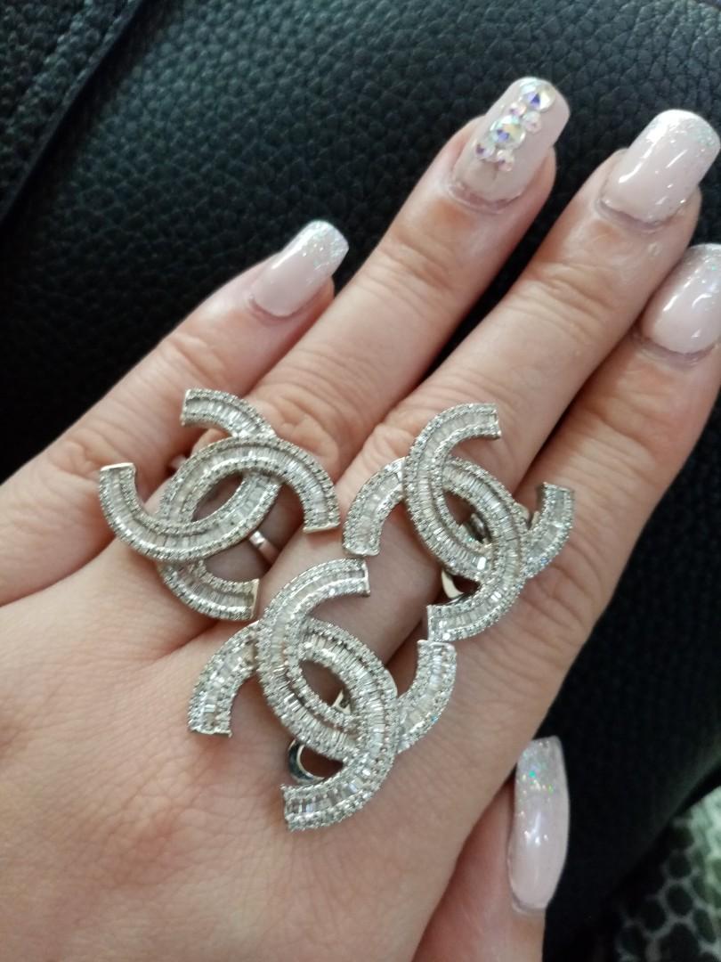 Chanel inspired imported diamond set and bracelet (Category: Luxury Accessories) located in Pasay City. Submitted by ms0718 (Listing ID 242251320, Image 2). Description: Imported 14k white gold with diamonds earrings ring and bracelet Can be bought separately Set cost 120k Bracelet 230k Serious buyers only pls.