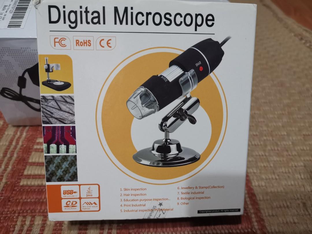 Digital Microscope (Category: Networking) located in Singapore. Submitted by max.tan.3344 (Listing ID 242237315, Image 1). Description: Digital Microscope. New and never use. Bough and keen some a while and box is out of shape..