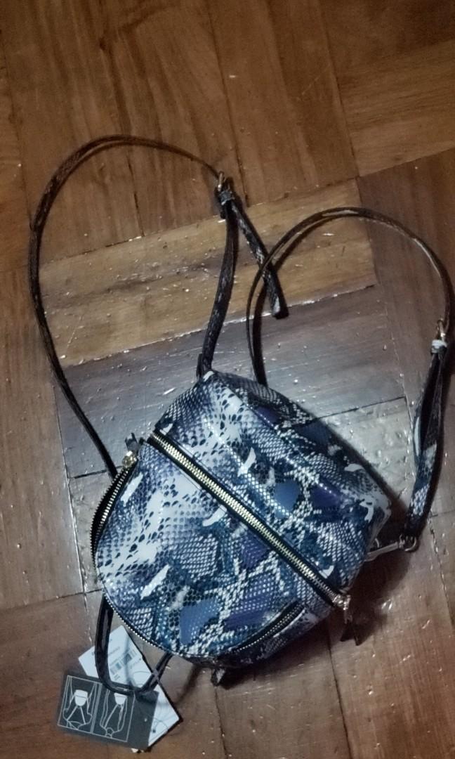 steve madden snakeskin backpack