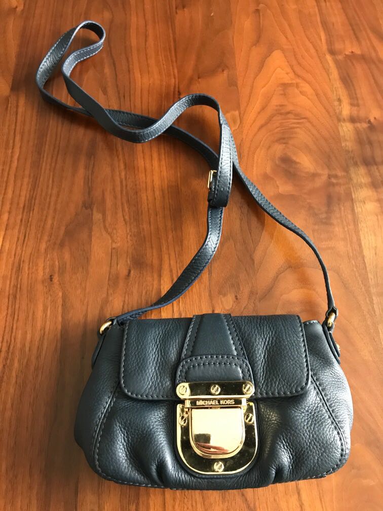Michael kors mini navy sling bag with gold buckle, Women's Fashion, Bags &  Wallets, Cross-body Bags on Carousell