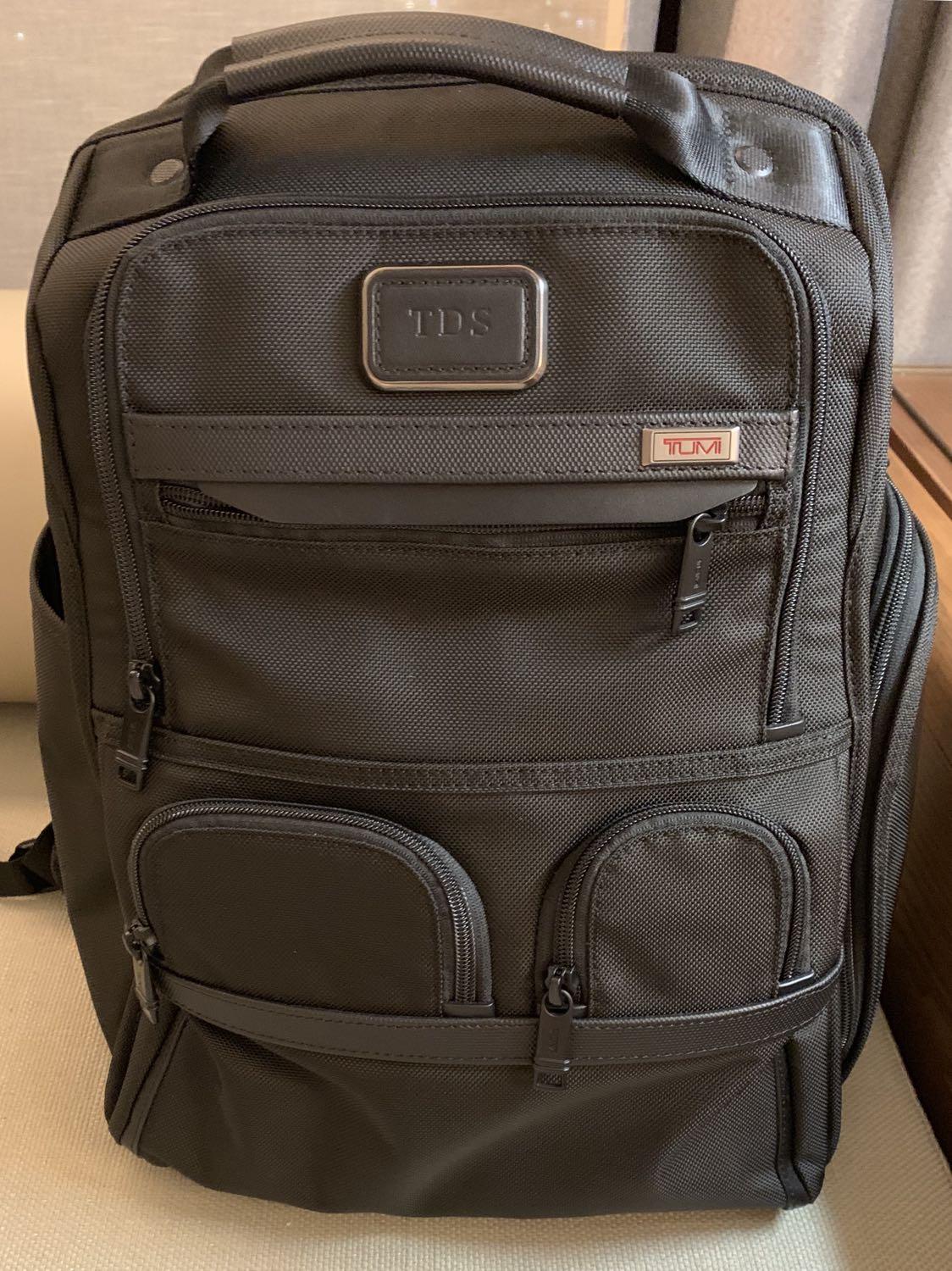 tumi compact laptop brief pack