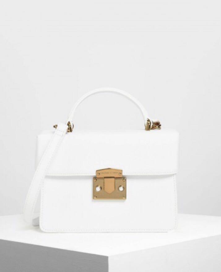 classic push lock top handle bag