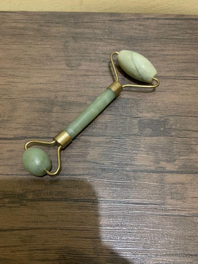 Jade roller (Category: Massage Devices) located in Quezon City. Submitted by lovingsh0pping (Listing ID 242699194, Image 1). Description: It was given to me but i never used it It was just stocked in the closet Not sure it if the real thing though..
