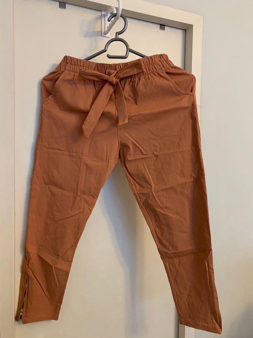 rust colored jeans