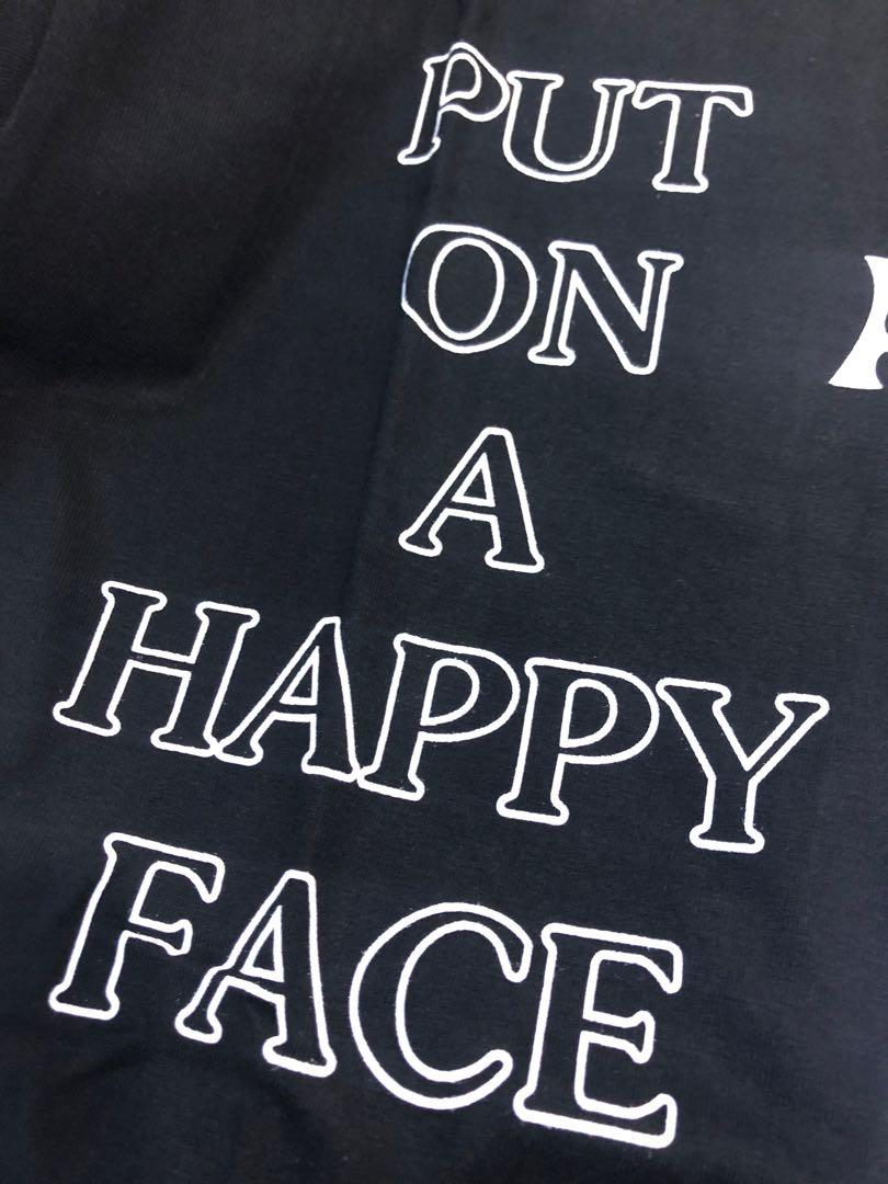 Astroworld put on on sale a happy face hoodie