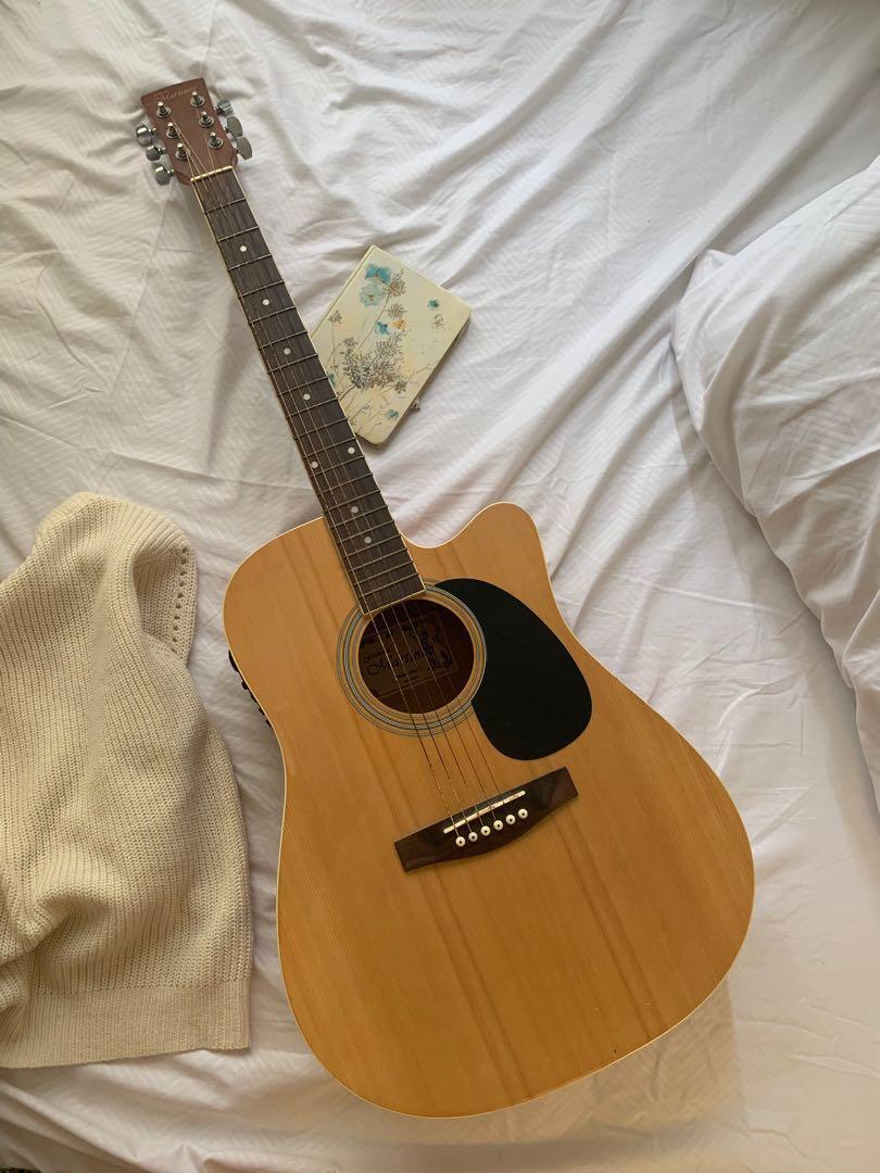 Frederick deals martinez guitar