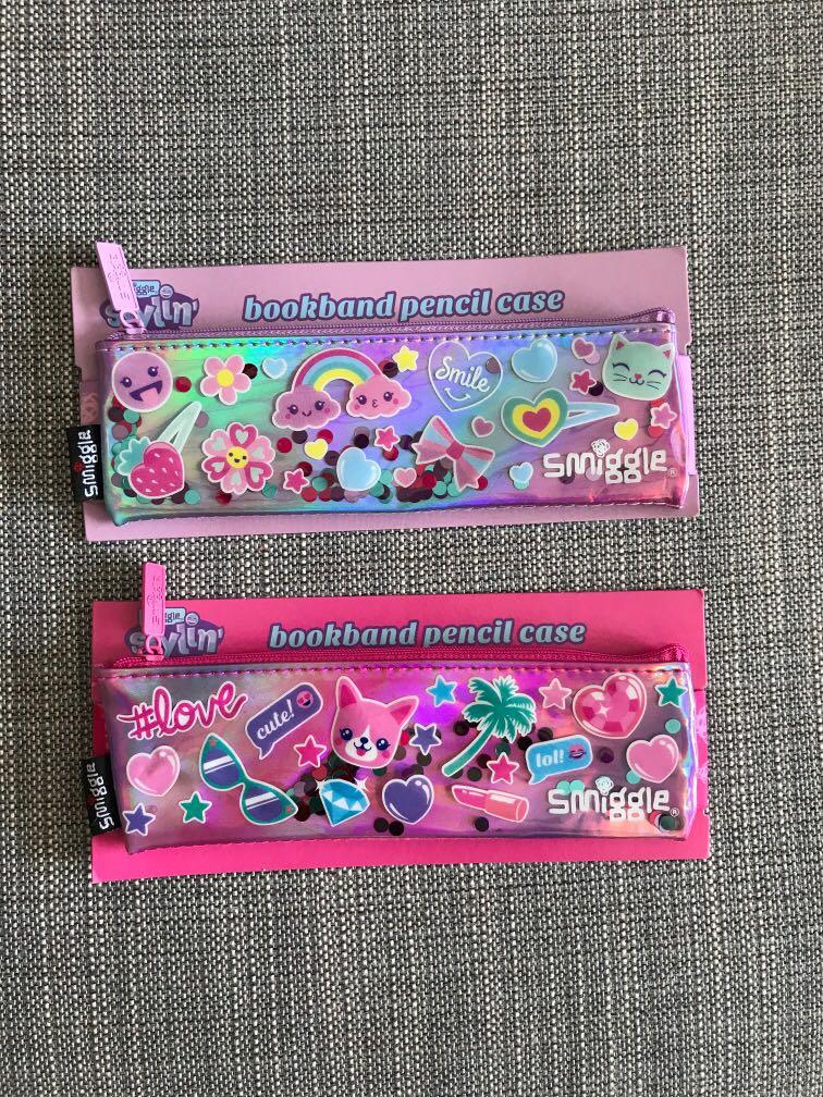 Smiggle Bookband Pencilcase - PINK ONLY (Category: Stationery & School Supplies) located in Bacoor. Submitted by chicchoices (Listing ID 242976745, Image 1). Description: Left pink bookband only.