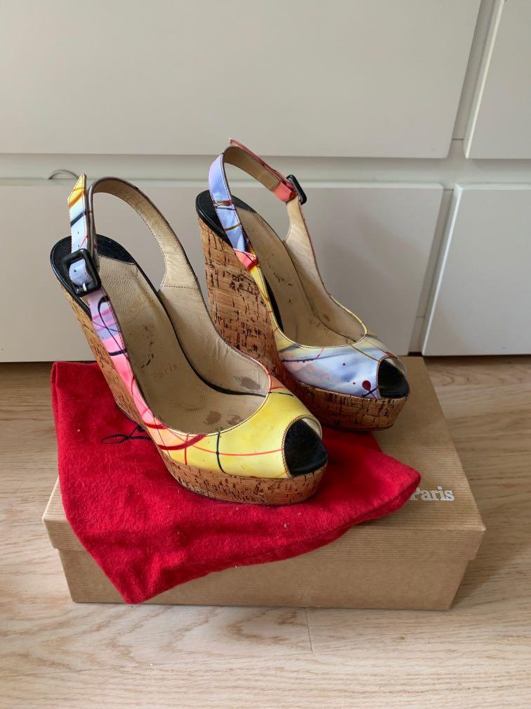 christian louboutin une plume wedge