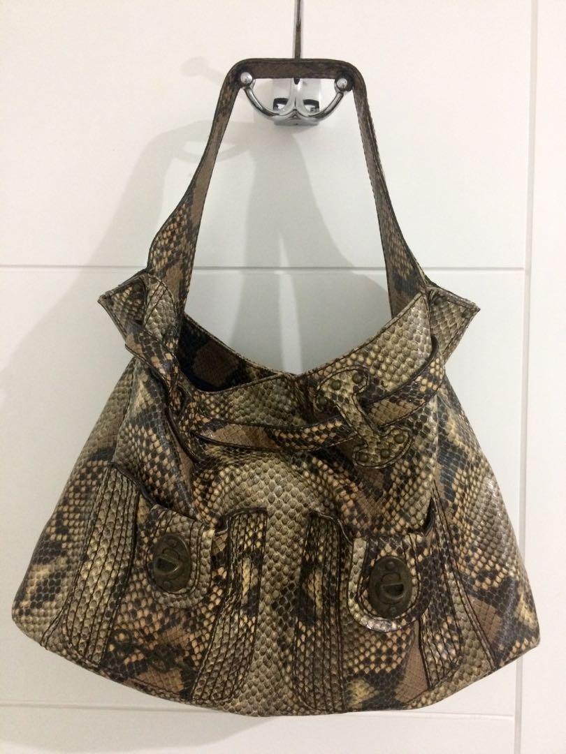 Jessica Simpson Bag (Category: Shoulder Bags) located in Marikina City. Submitted by livecat_f1c718 (Listing ID 243226817, Image 2). Description: Preloved Jessica Simpson Bag. Large Size. Still in excellent condition. Patent Leather Snake Skin Design. .