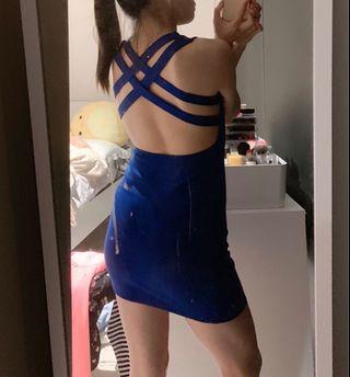 Open back blue cocktail dress