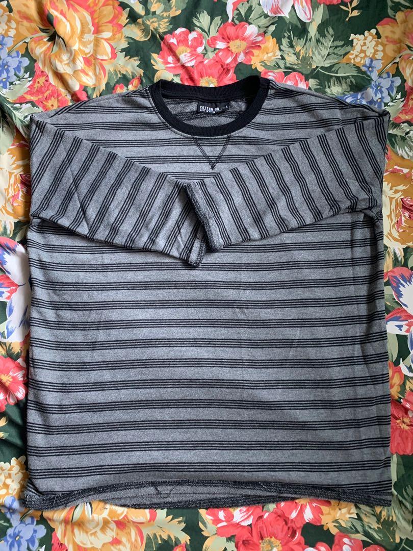 Cotton on Grey stripes 3/4 sleeves tshirt (Category: Longsleeves) located in Manila. Submitted by moziyah (Listing ID 243350668, Image 2). Description: **Size on shirt maybe small but can fit medium built **100% cotton **no stains or damages **looks brand new **comfy during rainy season **bought from sydney **RFS: decluttering.