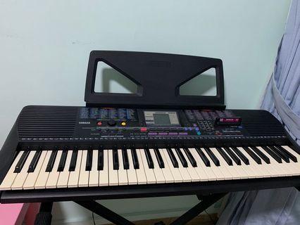 Yamaha keyboard with stand