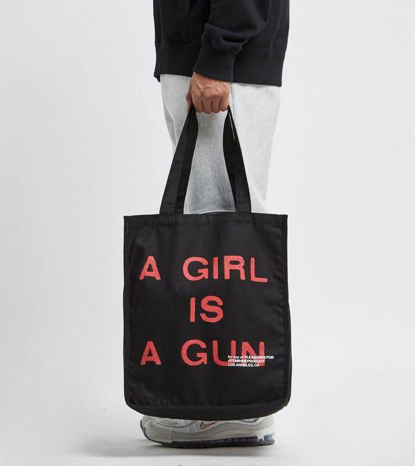A girl is store a gun tote