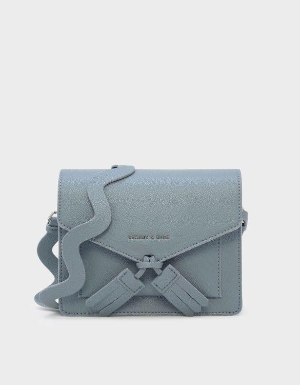 Charles and keith best sale tassel detail crossbody bag