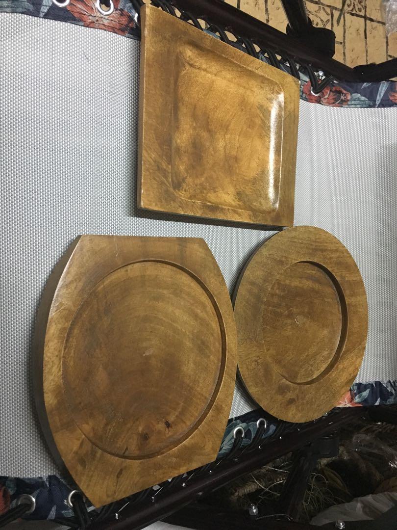 Sizzling plate wood trays (Category: Bakeware) located in Manila. Submitted by jli_nativecrafts (Listing ID 243547965, Image 1). Description: Sizzling plate tray made of acacia wood price varies on the size of your tray.