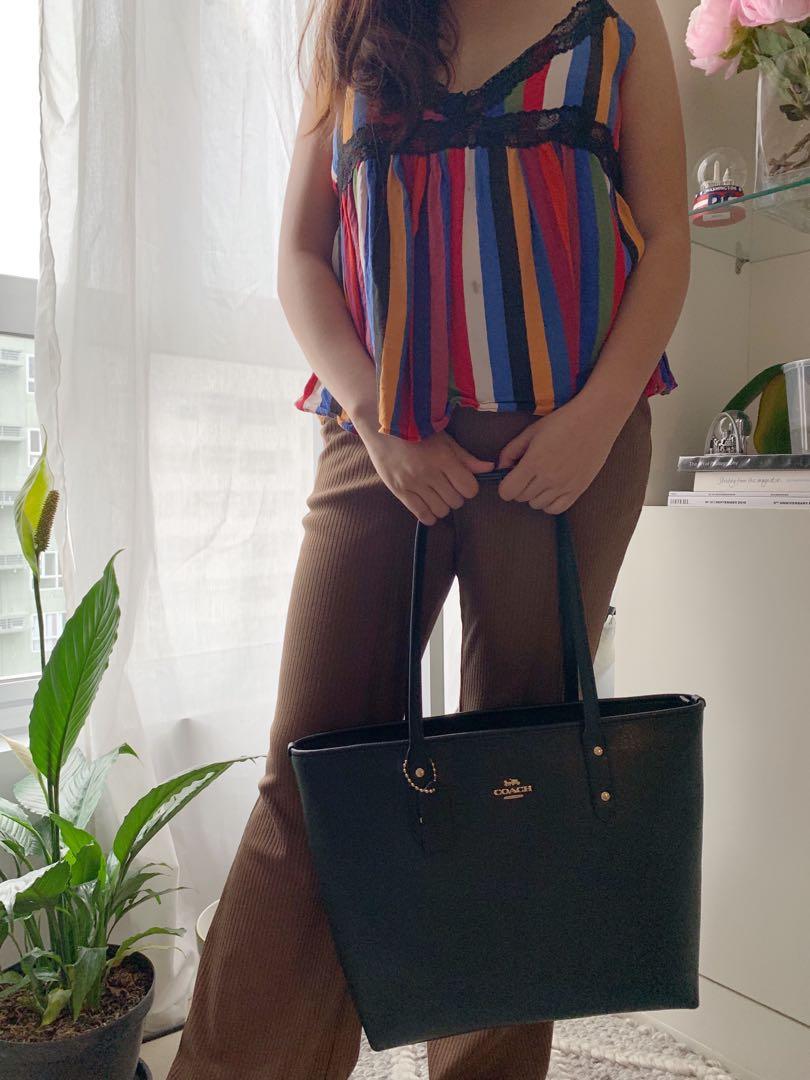 Authentic Coach City Zip Tote Bag (Category: Luxury Bags & Wallets) located in Taguig. Submitted by floseason (Listing ID 243800771, Image 1). Description: Super versatile bag. Available in brown, blue, white. Buy a used one for 7k Preorder a new one for 8k. Message for details. .