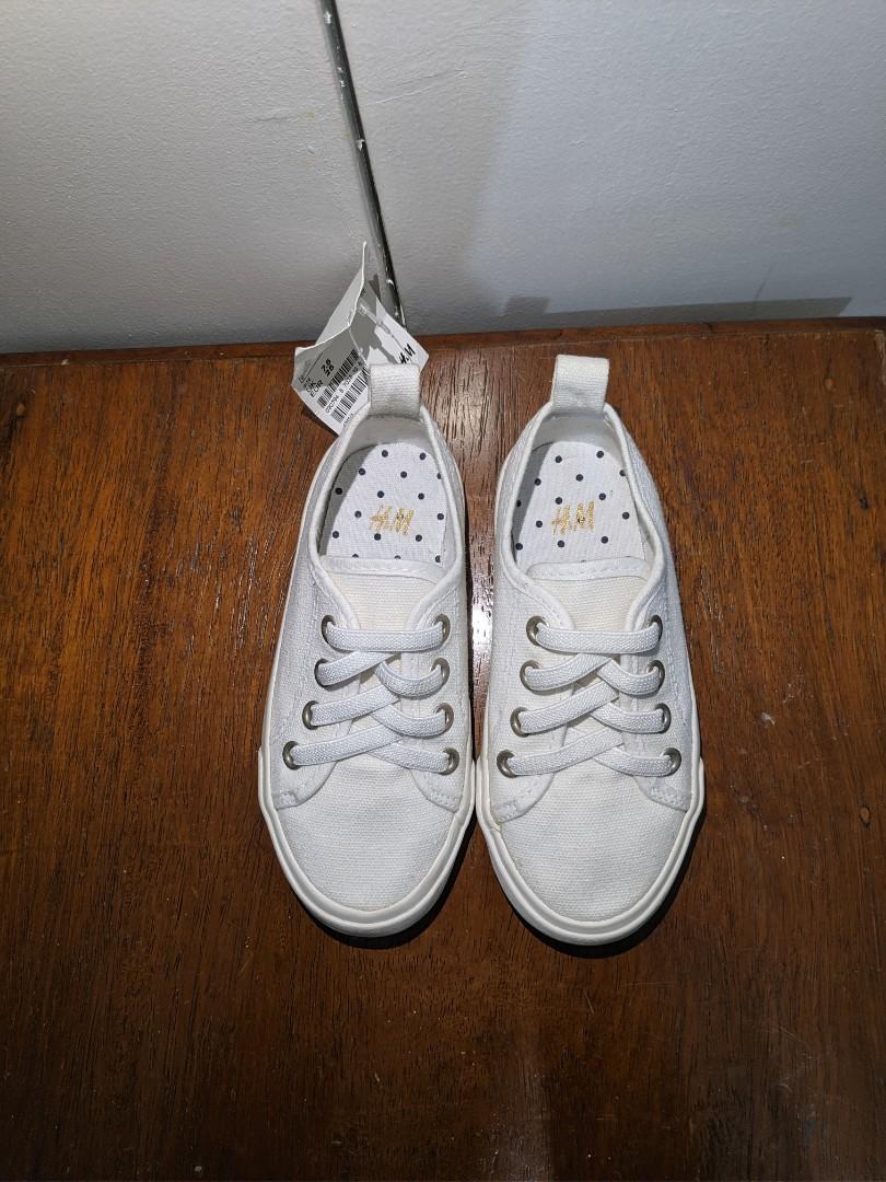 H&M White Sneakers for Toddlers (Category: Babies & Kids Fashion) located in Cainta. Submitted by almurk (Listing ID 243682481, Image 2). Description: Brand New Unused H&M White Sneakers for Toddlers. H&M tag still attached. Stretch Shoe Laces Can fit my daughter who is 3 yrs old. RFS: Extra White Sneakers.