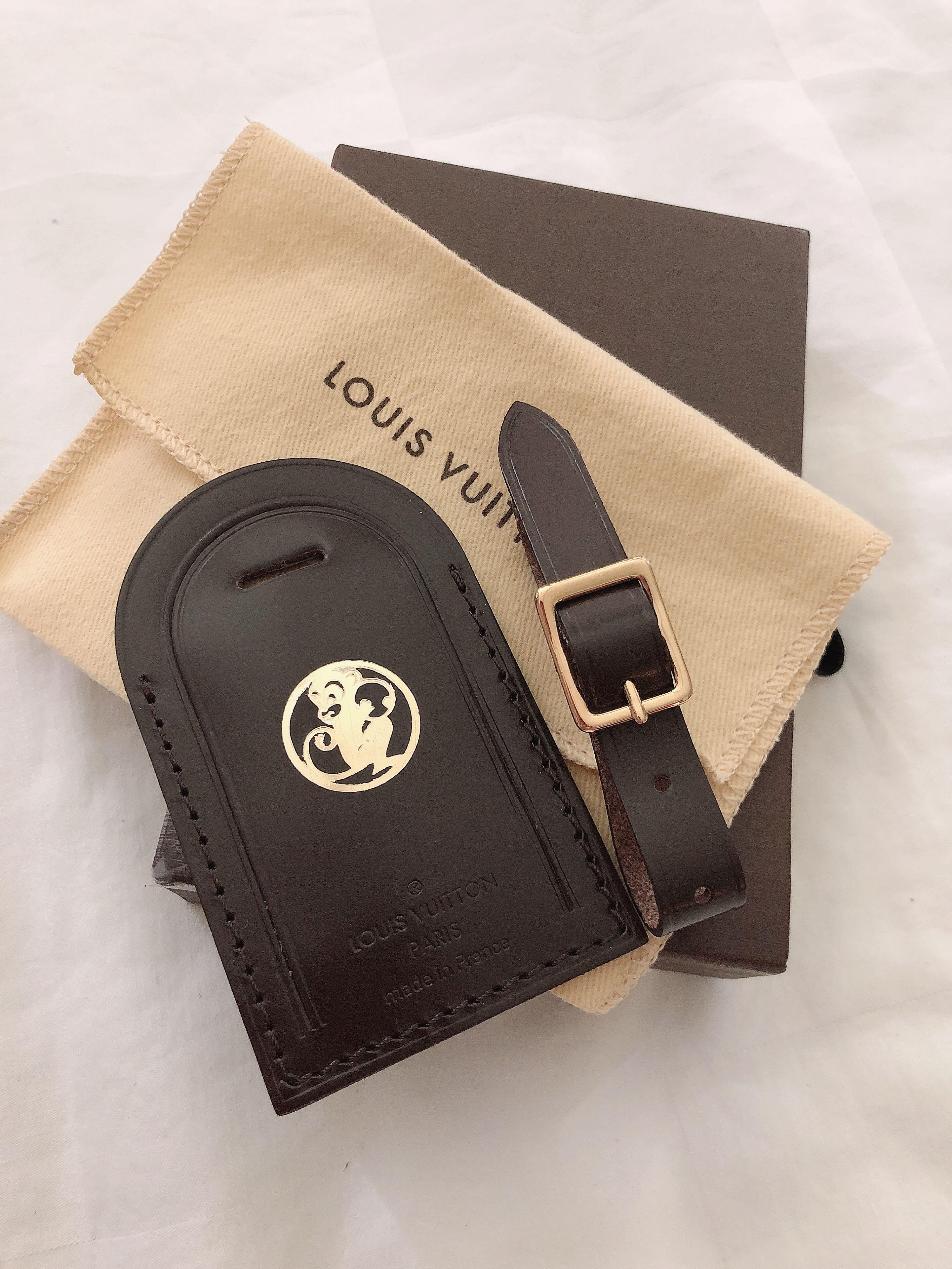 Louis Vuitton LV luggage tag Monkey year hot stamp charm, Women's Fashion,  Bags & Wallets, Purses & Pouches on Carousell