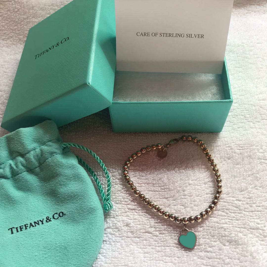 return to tiffany mini heart tag in sterling silver on a bead bracelet