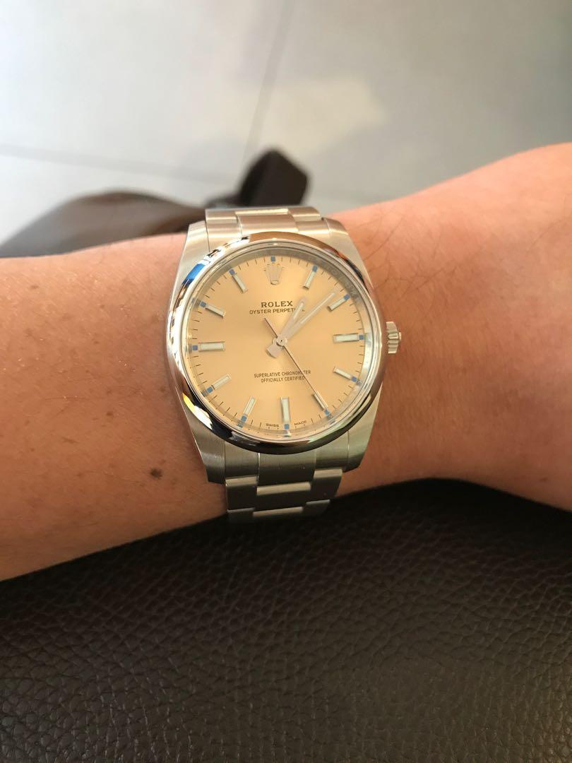 rolex oyster perpetual champagne dial