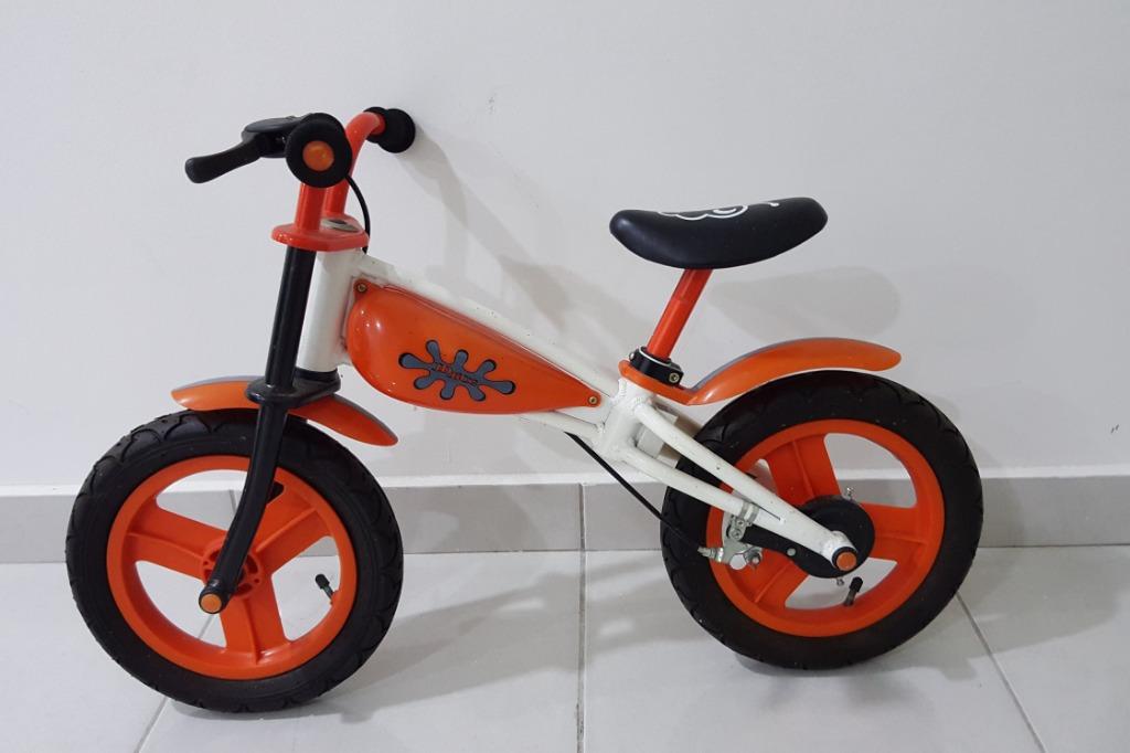 orange toddler bike
