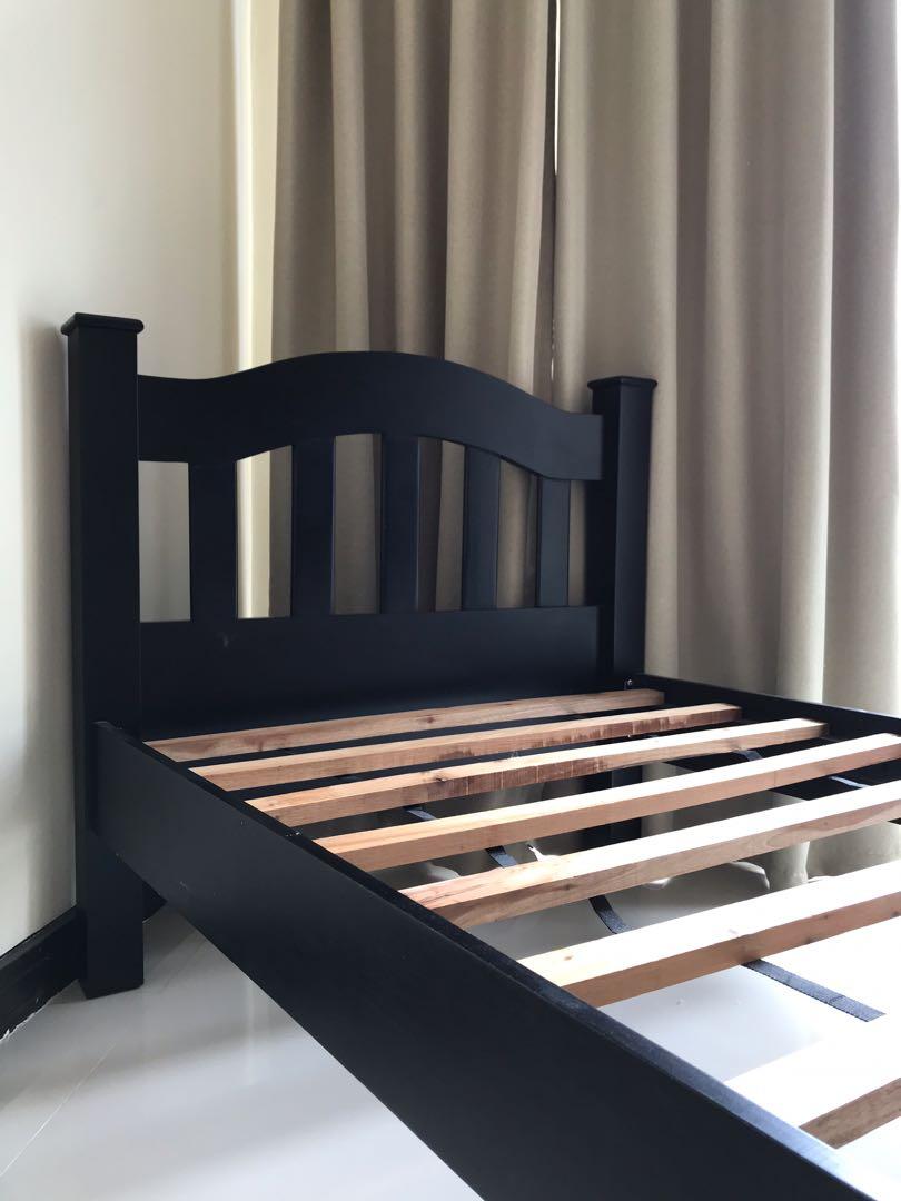 Black wooden shop single bed frame