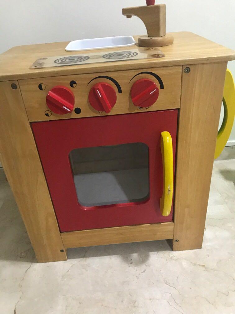 wooden toy kitchen with washing machine