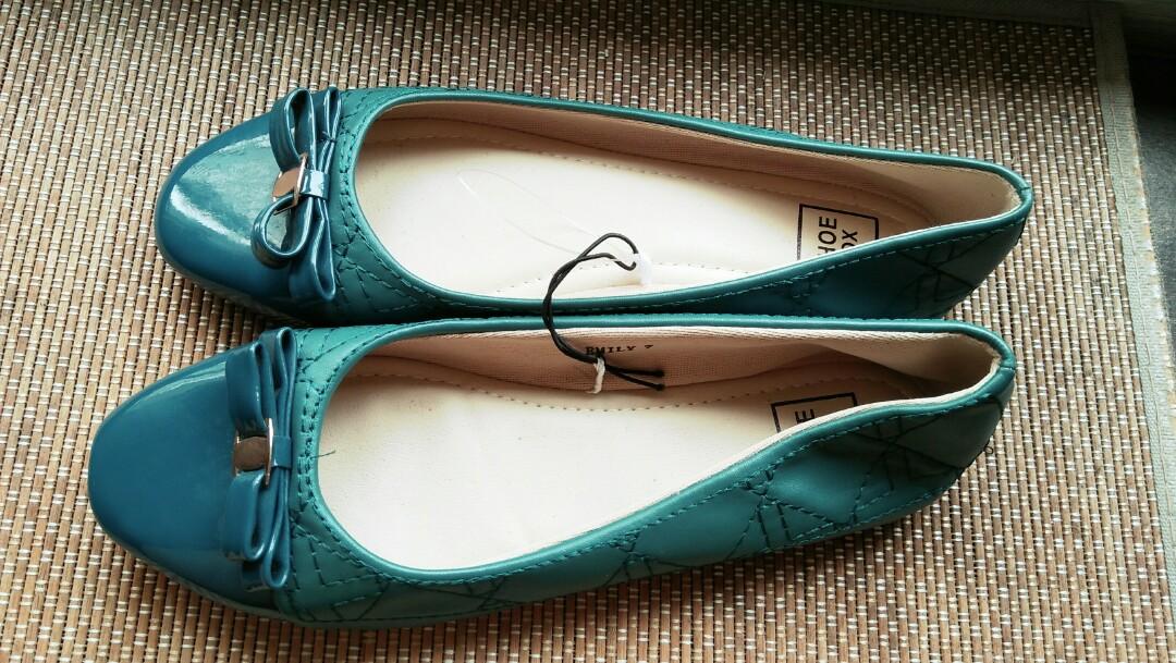 flat teal shoes