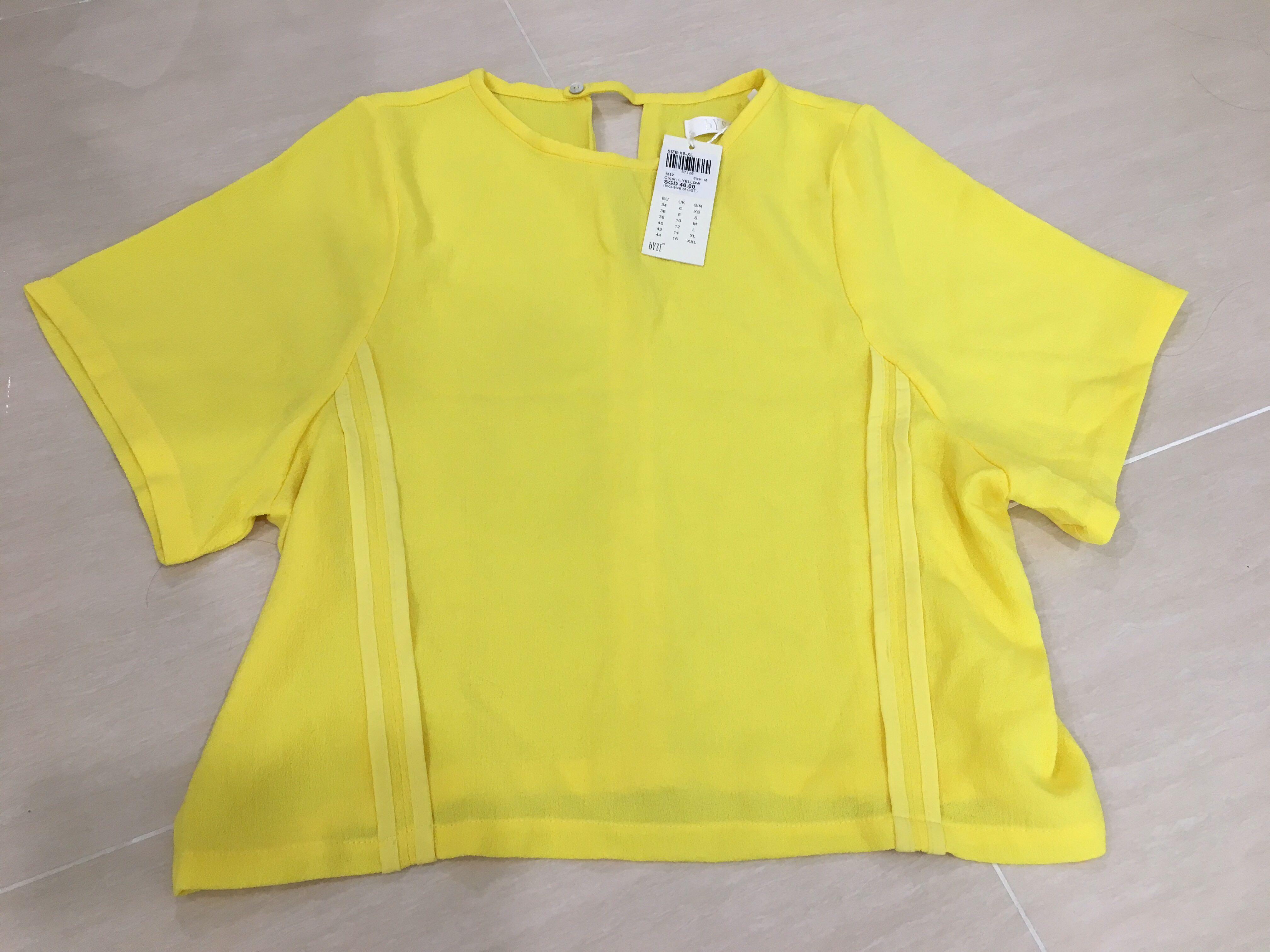 bright yellow blouse