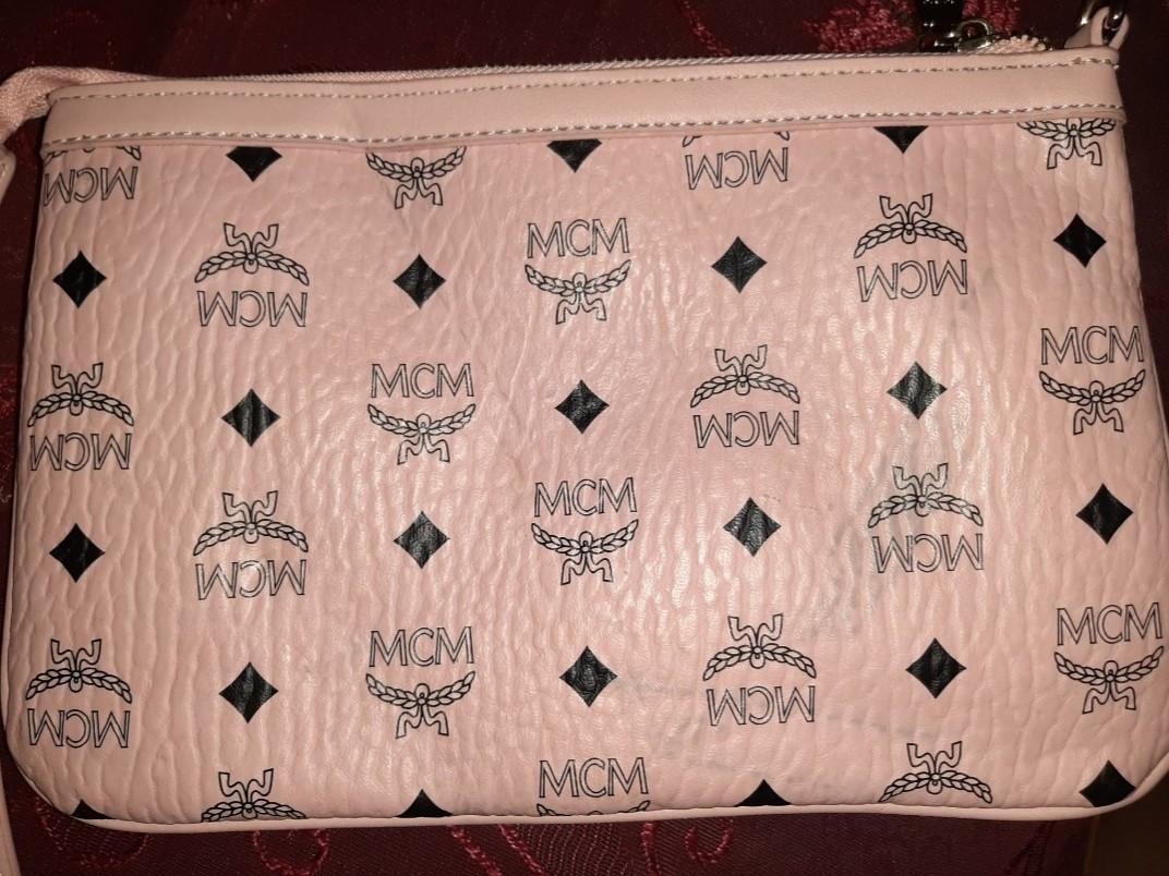 MCM POCHETTE (Category: Purses & Pouches) located in Pasig City. Submitted by theluxbaghunter (Listing ID 244173012, Image 2). Description: Good condition Sign of minor use #choosetocare.