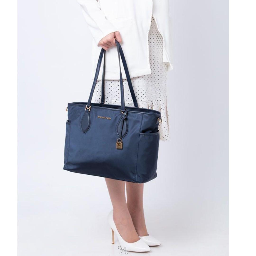 Michael kors diaper 2025 bag blue