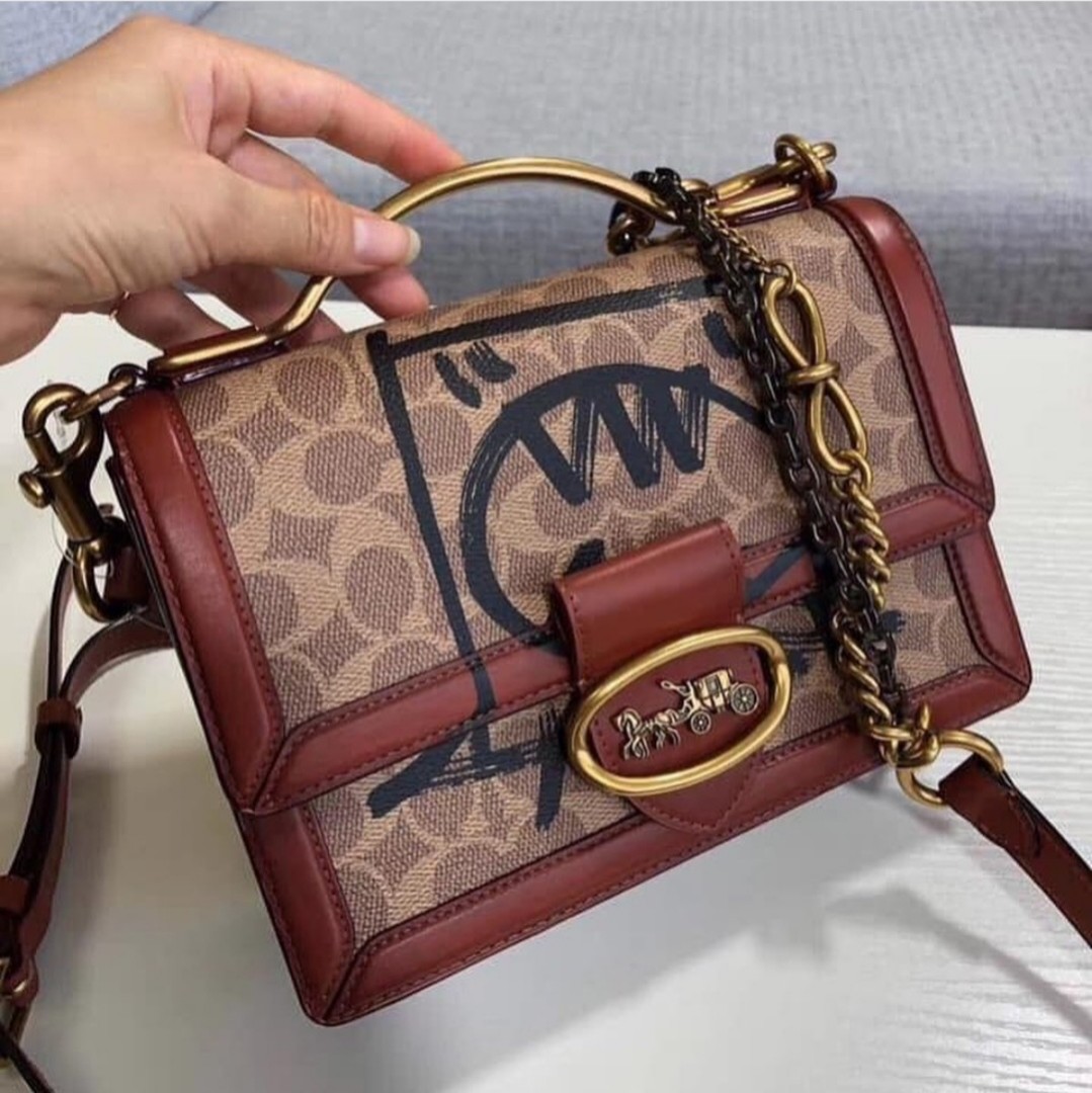 riley top handle 22 in signature canvas