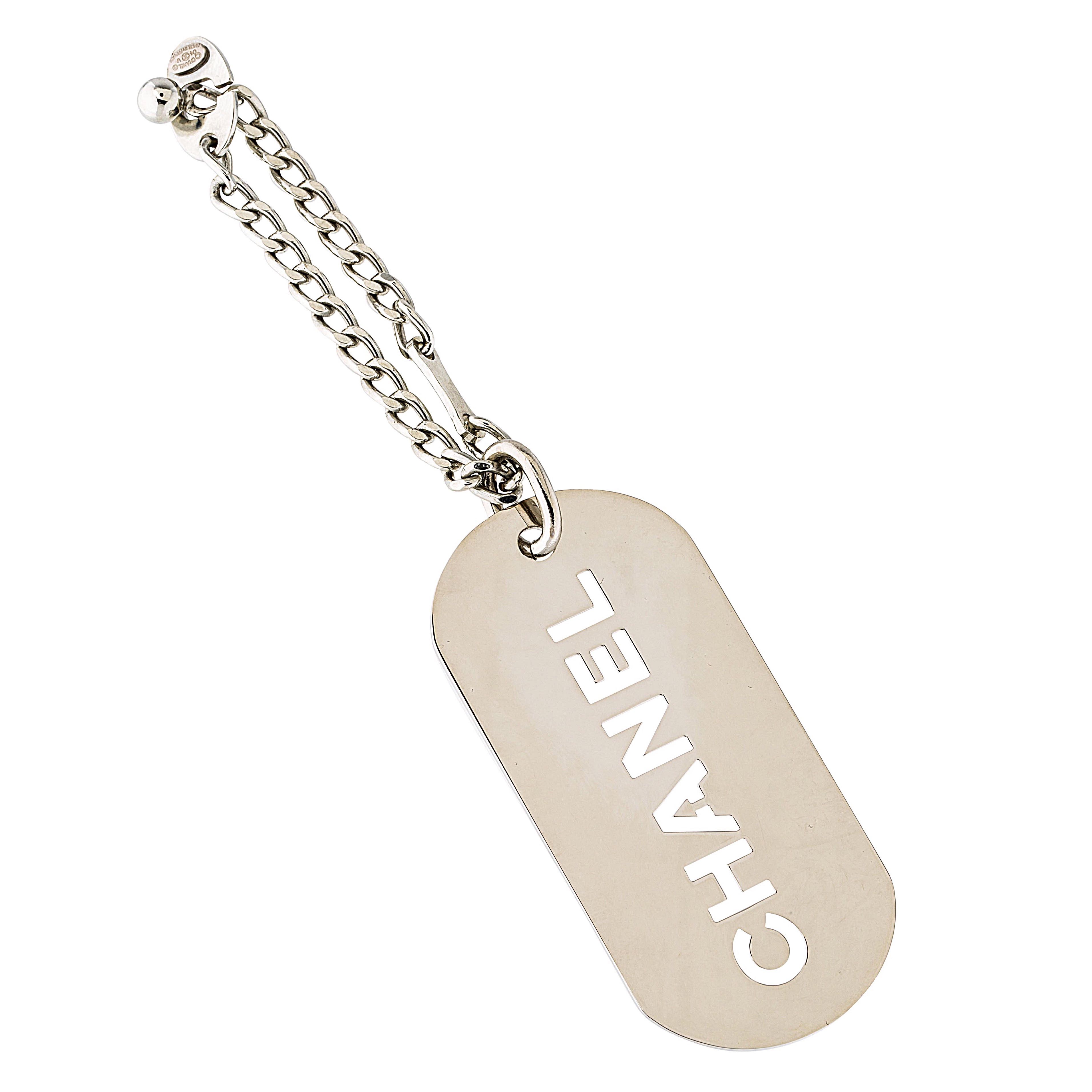 Authentic Chanel Dog Tag Keychain Silver Tone Charm Necklace, Luxury,  Accessories on Carousell