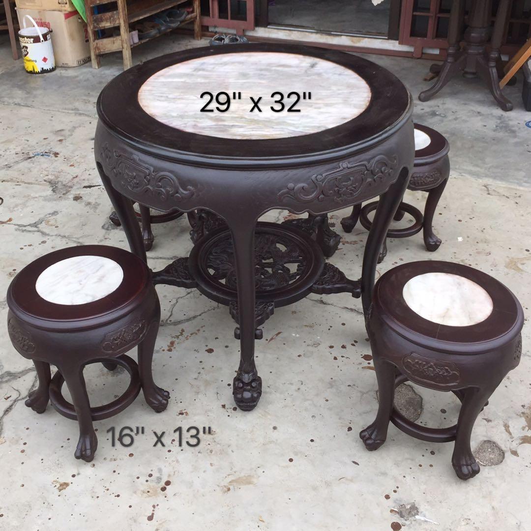 Old marble table set (Category: Tables & Sets) located in Pontian. Submitted by rocz (Listing ID 244453026, Image 1). Description: Very nice carving marble table with 4 stools. Not sure of woodtype. .
