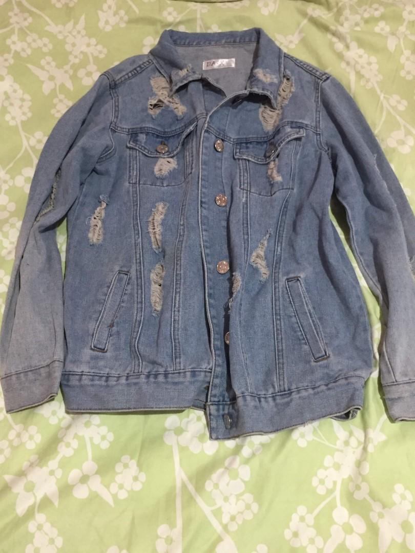 tattered jean jacket