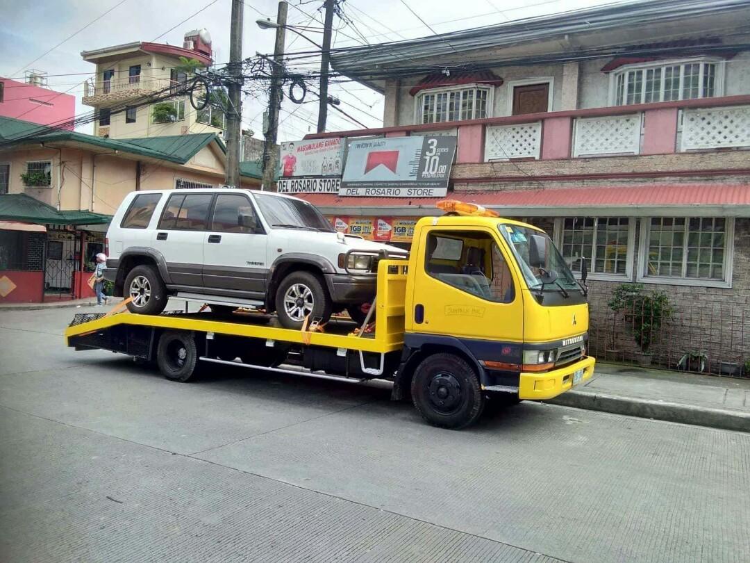 Towing services self loading car carrierr tow truck flat bed wrecker, Vehicle Rentals on Carousell