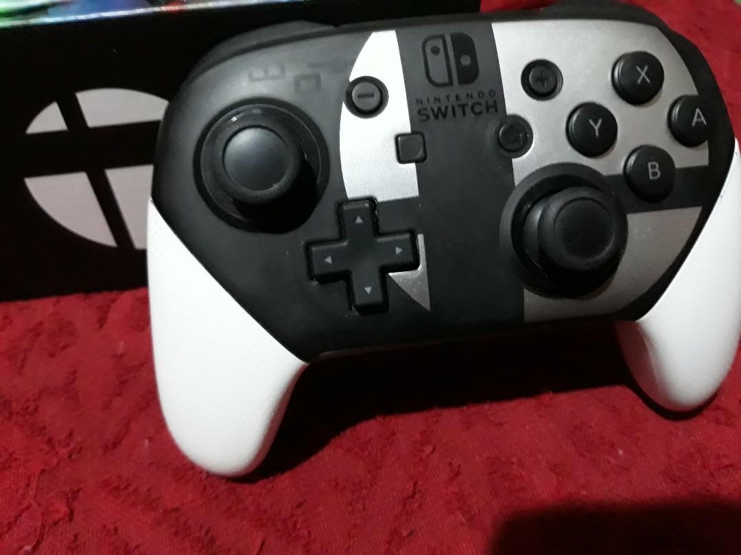 Original nintendo switch pro controller super smash bros edition, Video