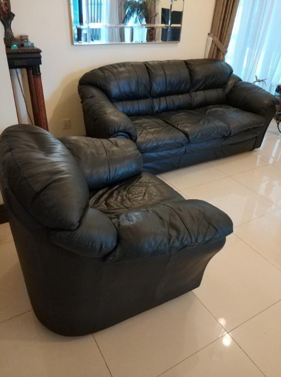 Used black outlet leather sofa