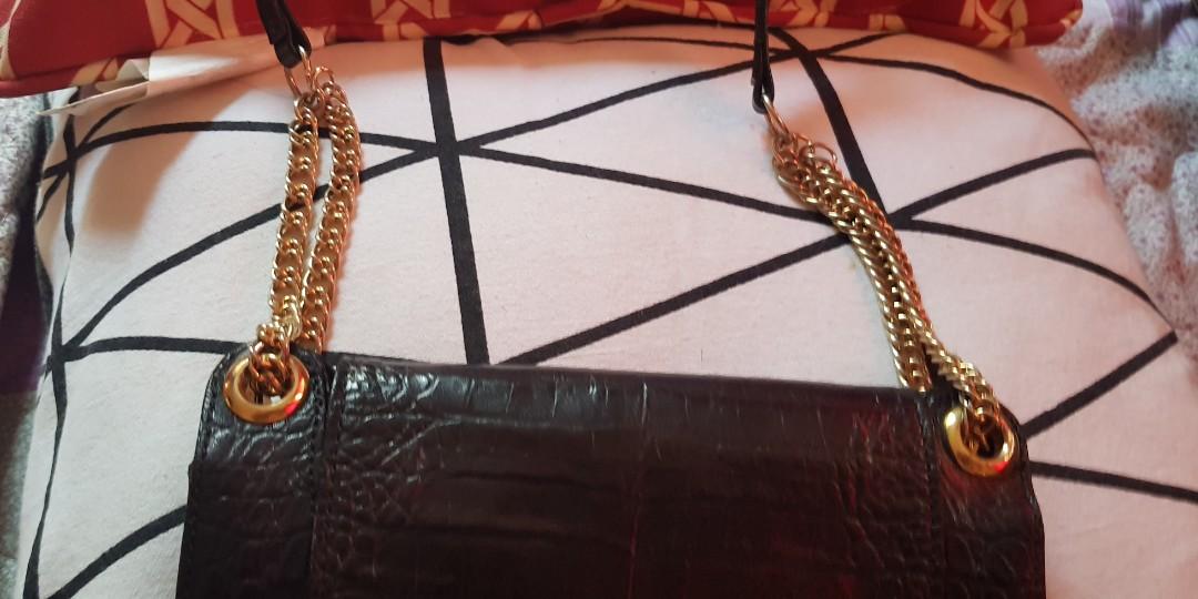 Italy fashion bag (Category: Luxury Bags & Wallets) located in Cabuyao City. Submitted by marcliane (Listing ID 244830983, Image 3). Description: Another classy and fashionabl leather made sling bag! Never use so.considered new. With pocket at the back...please add 100 pesos for the shipping fee.